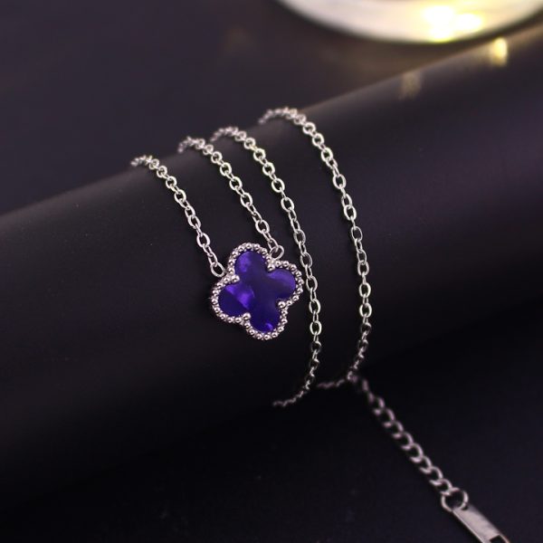 TN840d Dây chuyền titan hoa 4 cánh van cleef nền màu tím