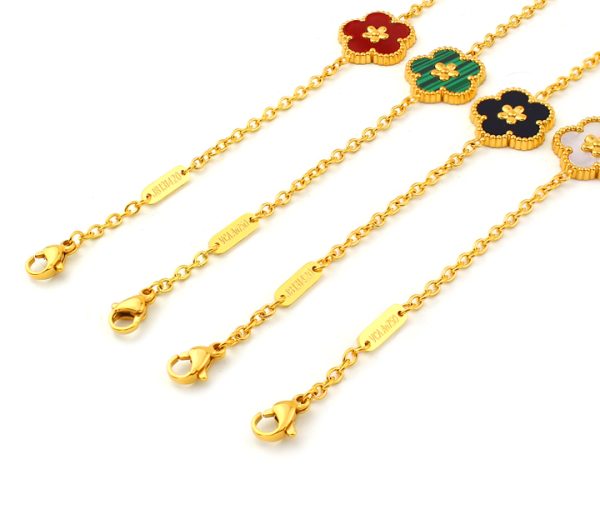 TA077c Lắc tay nữ titan van cleef hoa 5 cánh
