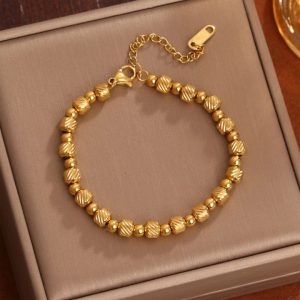 TA091e Lắc tay nữ bi titan chạm máy