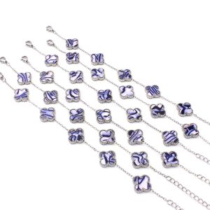 TA497c Lắc tay titan hoa 4 cánh van cleef