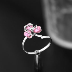 N011a Nhẫn nữ inox free size cỏ 3 lá đá hồng