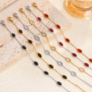 TA213f Lắc tay nữ titan đính đá zircon đỏ hình mắt ngựa