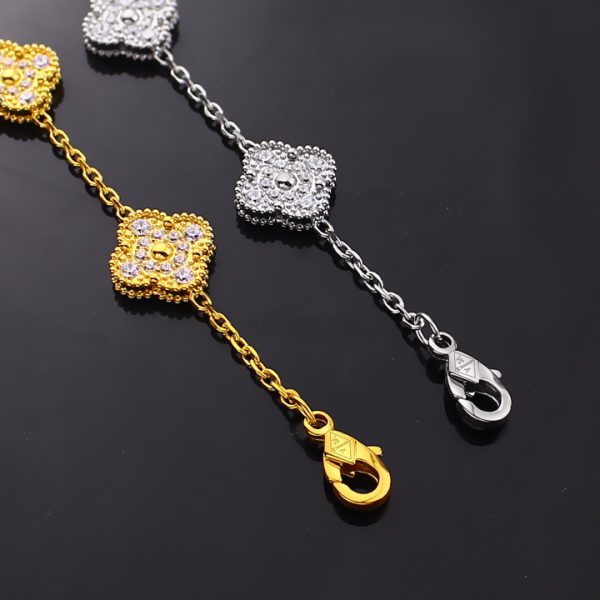 TA230e Lắc tay nữ titan 5 hoa 4 cánh van cleef đính full đá trắng size 11mm