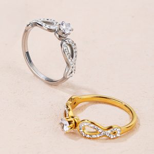 TC019b-Nhẫn nữ titan 1 hột cao cách điệu 2 bên dấu vô cực