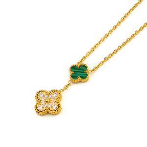TN642a Dây chuyền titan hoa 4 cánh nền xanh van cleef LV