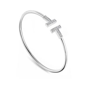 TV121d Vòng tay titan nữ 2 chữ T đính đá Tiffany