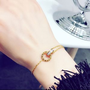 TA002 Lắc tay nữ titan số la mã màu vàng