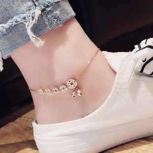 TA507 Lắc chân titan kim tiền có gắn chuông vàng hồng