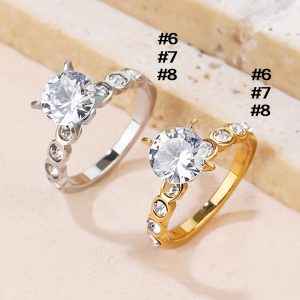 TC016 Nhẫn nữ titan 1 hột đứng đính kim cách điệu 2 bên