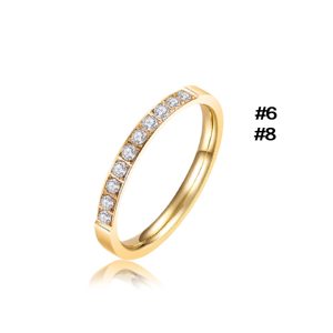 TC118 Nhẫn titan đính đá nữa chiếc (màu vàng size 6-8)